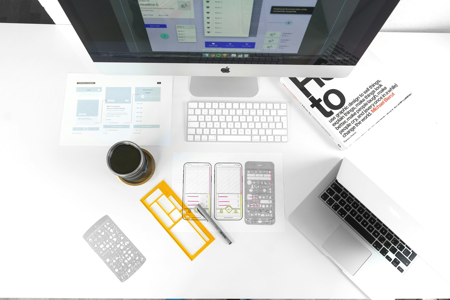 Overhead view of a carefully arranged graphic design workspace