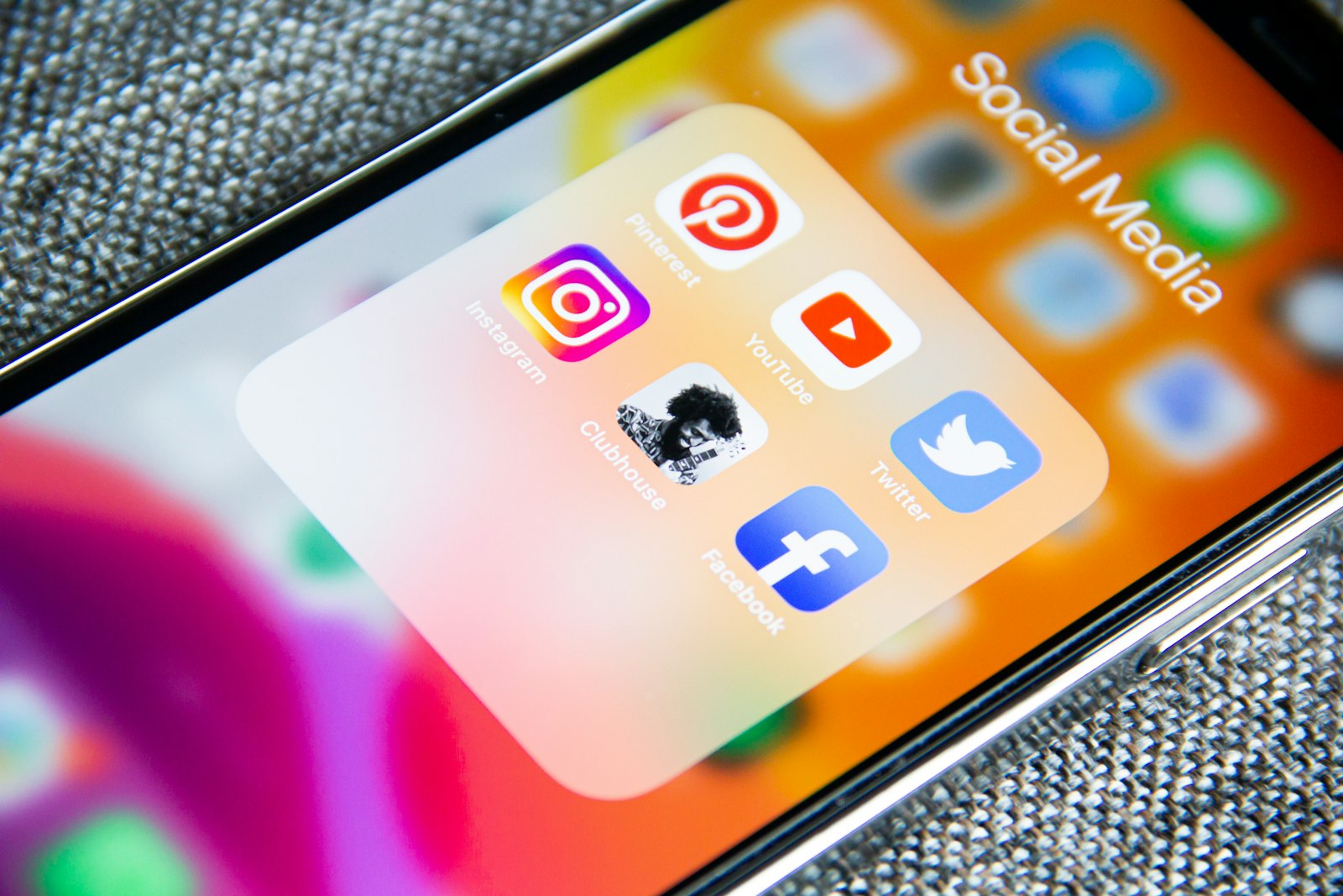 Smartphone screen showing a folder of social media apps